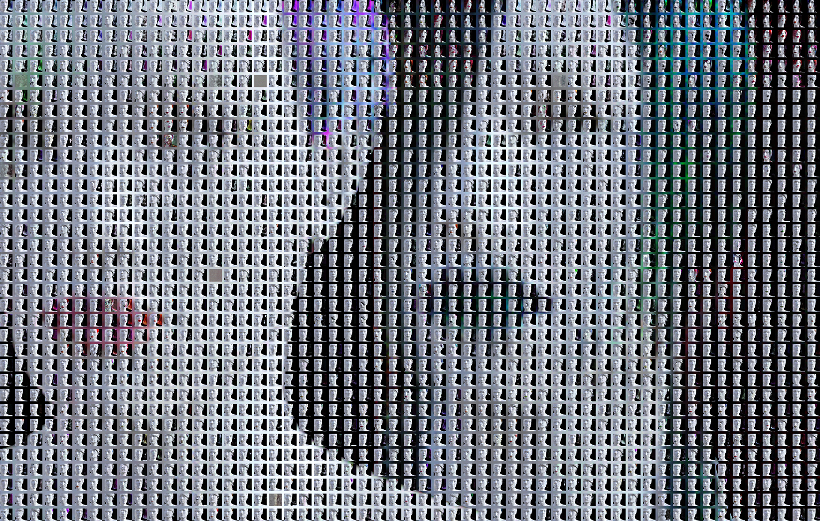 the new generated work for Knox immerse, two genderqueer faces made up of a spaced mosaic of smaller faces in different stages of resolution as the AI learns.